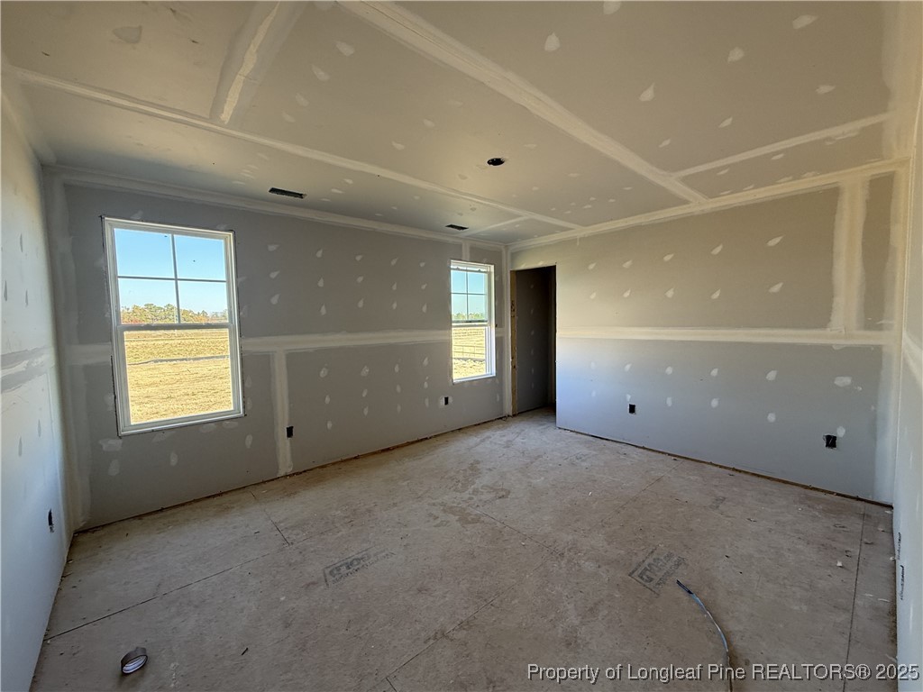 188 Buggy Top Lane Autryville, NC 28318 - Photo 7 of 12 a view of an empty room with a window
