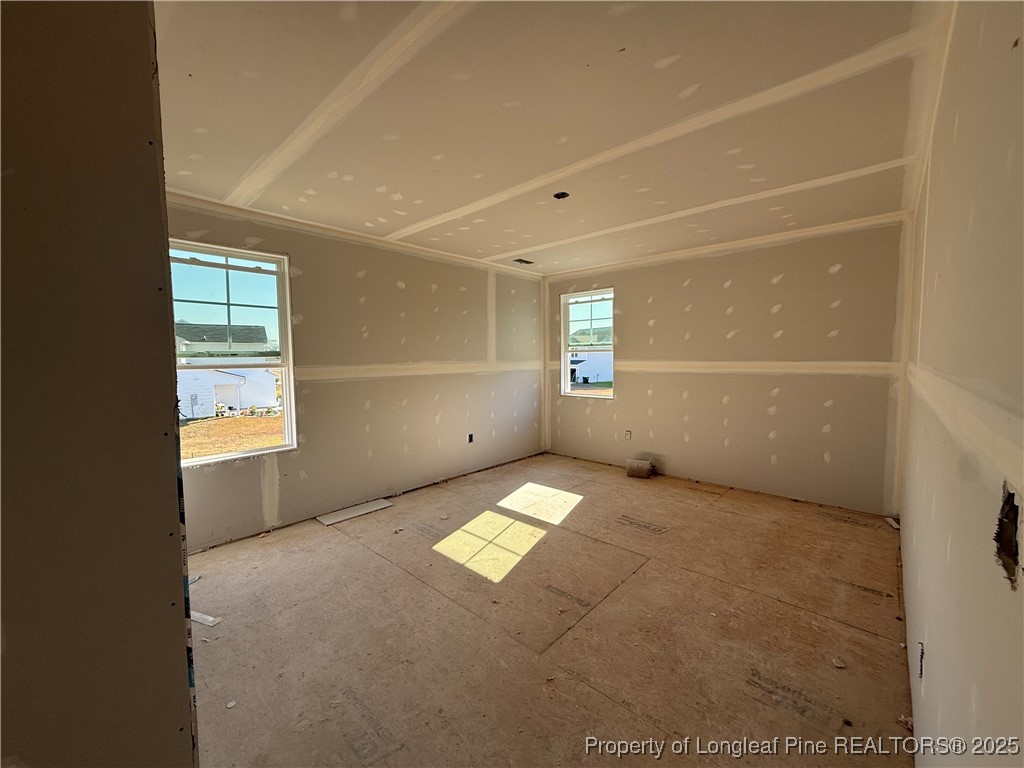 188 Buggy Top Lane Autryville, NC 28318 - Photo 8 of 12 a view of an empty room with a window