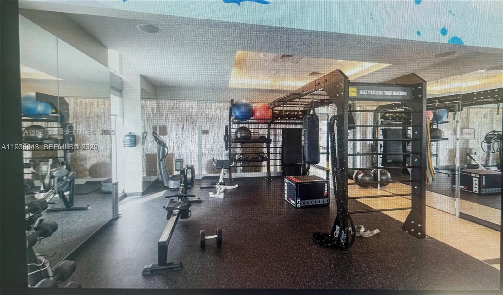 1111 Southwest 1st Street, Unit 2616 Miami, FL 33130 - Photo 24 of 27 a view of a room with gym equipment