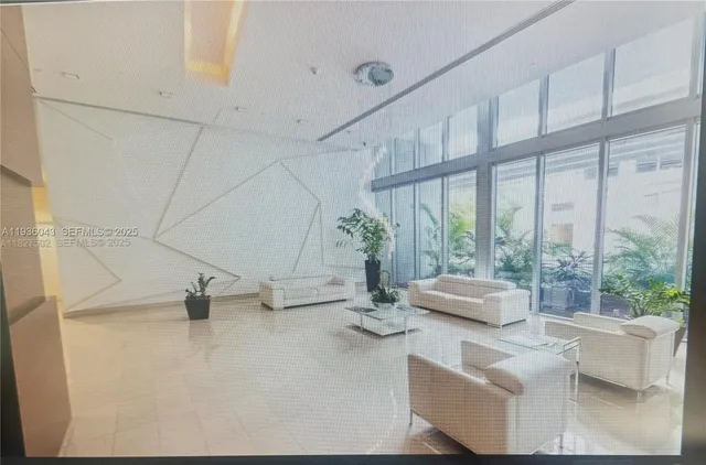 a kitchen with a sink and a stove top oven