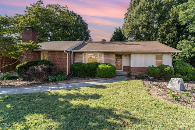 a view of a house with a swimming pool