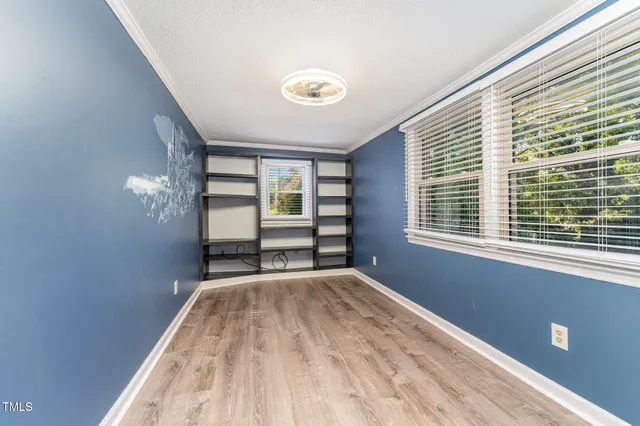 a view of empty room with a window