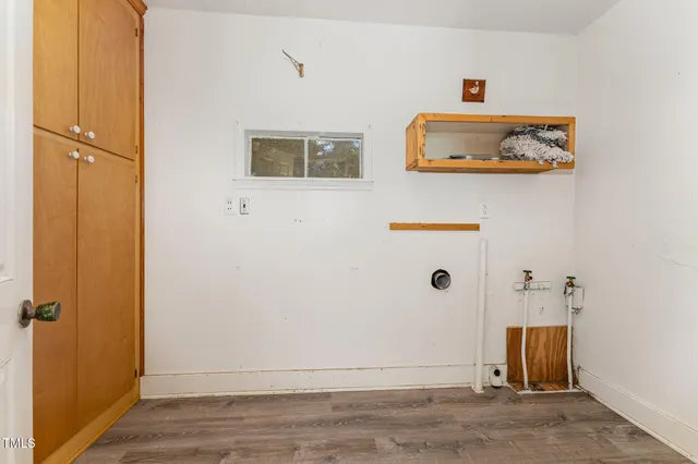 front view of a house with a garden