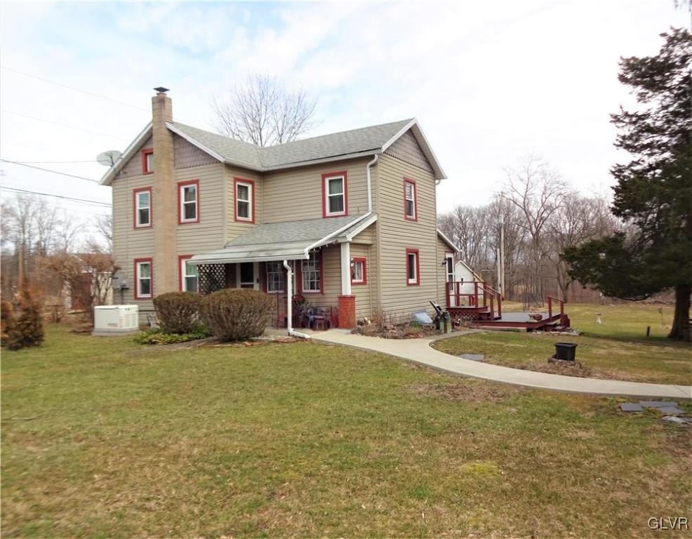 583 Shooktown Road Bangor, PA 18013 - Photo 1 of 44 a view of a house with a yard and large tree