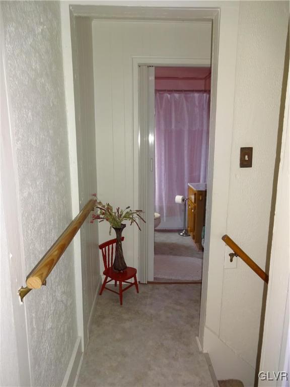 583 Shooktown Road Bangor, PA 18013 - Photo 31 of 44 a view of a hallway with couch and a mirror
