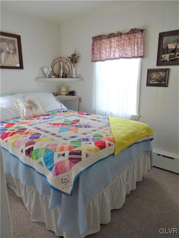 583 Shooktown Road Bangor, PA 18013 - Photo 34 of 44 a bedroom with a bed and mirror