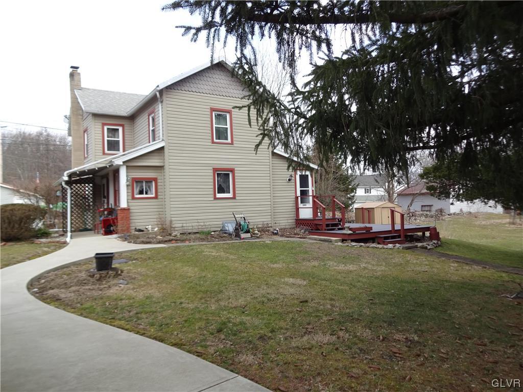583 Shooktown Road Bangor, PA 18013 - Photo 4 of 44 a view of a house with a yard and garage