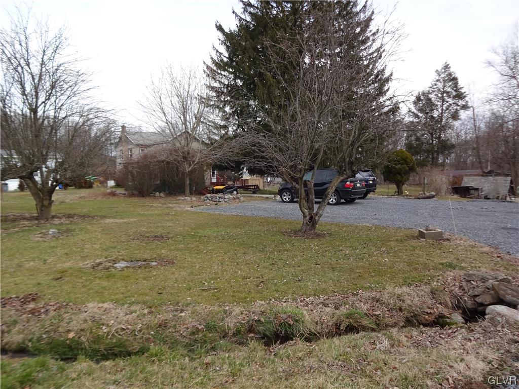 583 Shooktown Road Bangor, PA 18013 - Photo 8 of 44 a view of a tree in the middle of a yard
