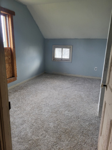 801 Main Street Crescent City, IL 60928 - Photo 10 of 11 an empty room with a window