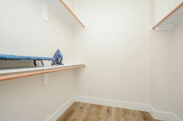 a bathroom with a sink and cabinets