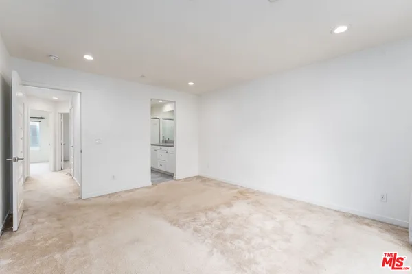 a view of an empty walk in closet