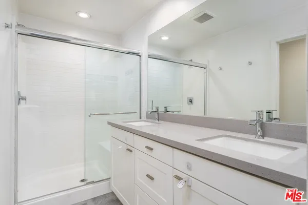 an empty room with closet area