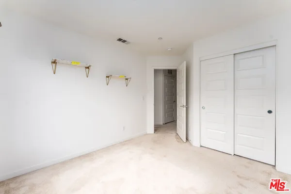 a front view of a building with street