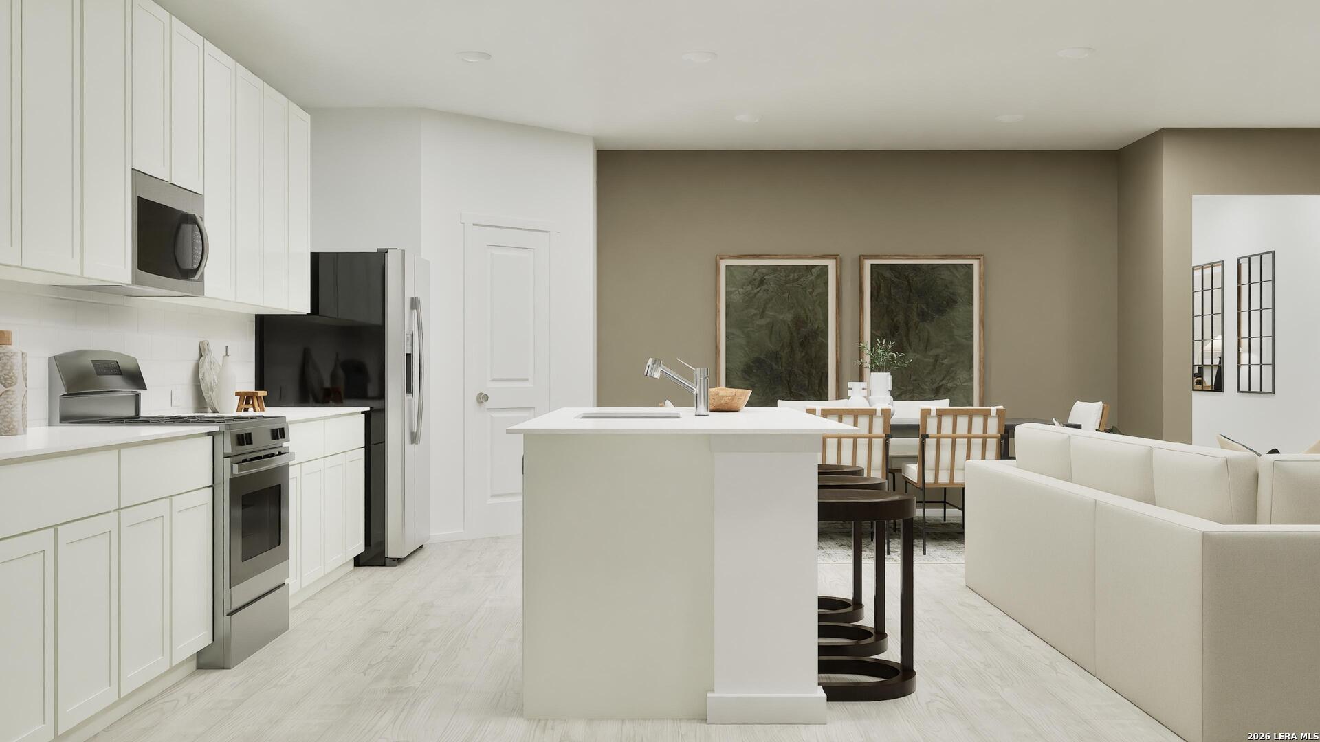 2123 Apollo Drive Portland, TX 78374 - Photo 14 of 32 a living room with furniture a flat screen tv and a refrigerator