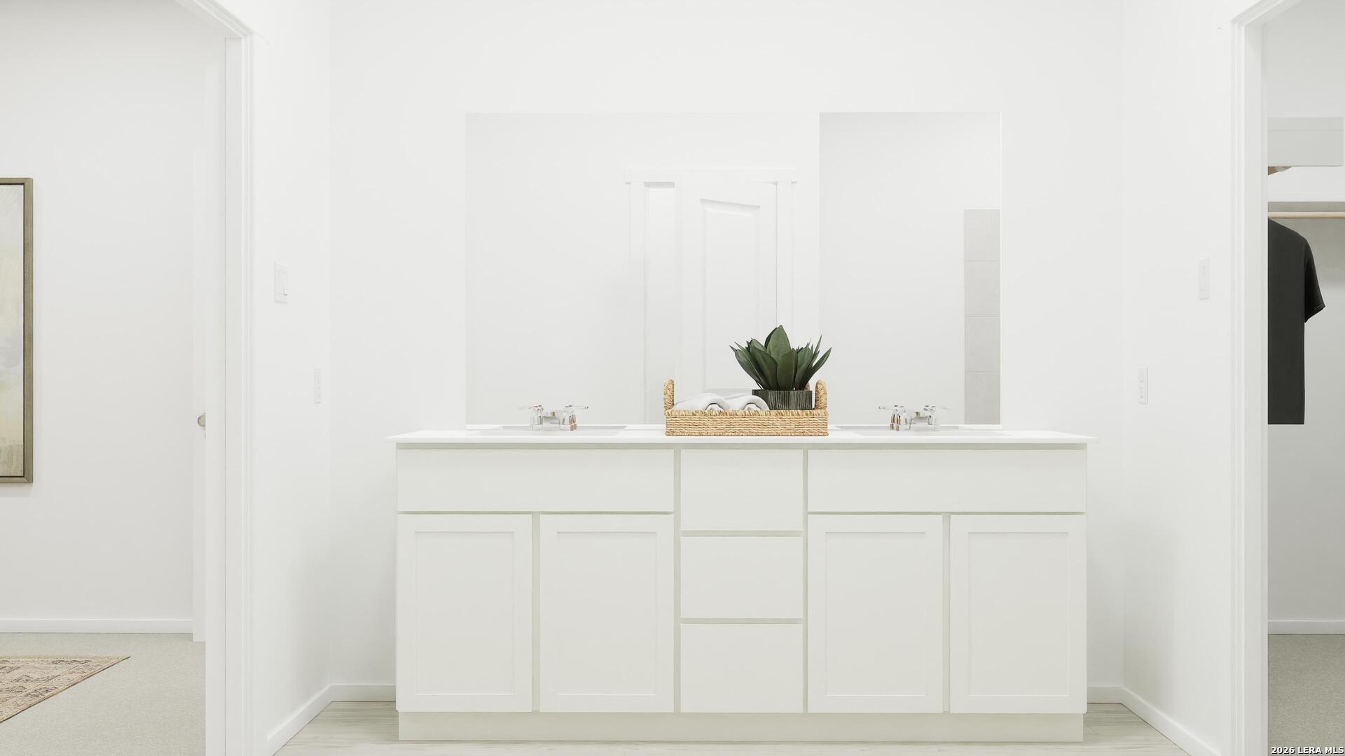 2123 Apollo Drive Portland, TX 78374 - Photo 24 of 32 a bathroom with a sink and mirror