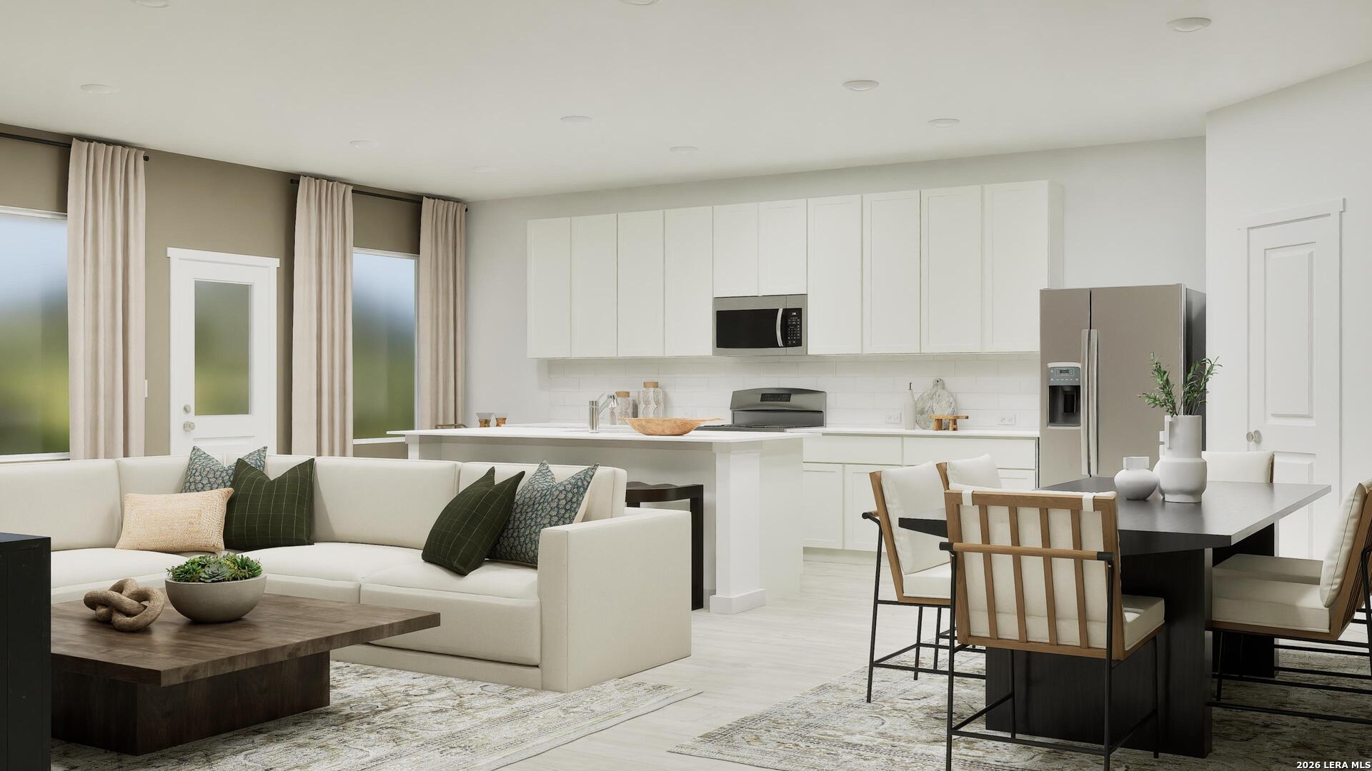 2123 Apollo Drive Portland, TX 78374 - Photo 9 of 32 a living room with kitchen island furniture and a fireplace