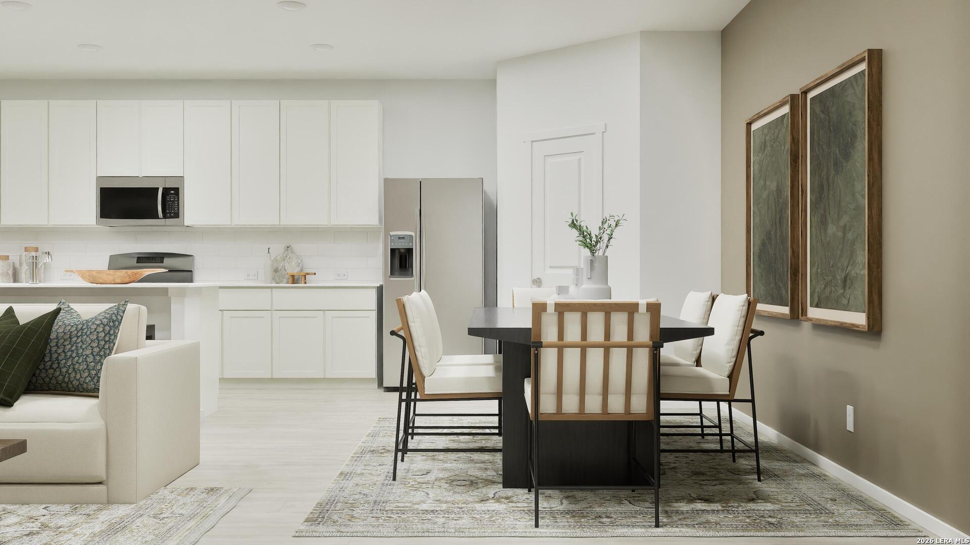 2123 Apollo Drive Portland, TX 78374 - Photo 10 of 32 a view of a dining room with furniture and wooden floor