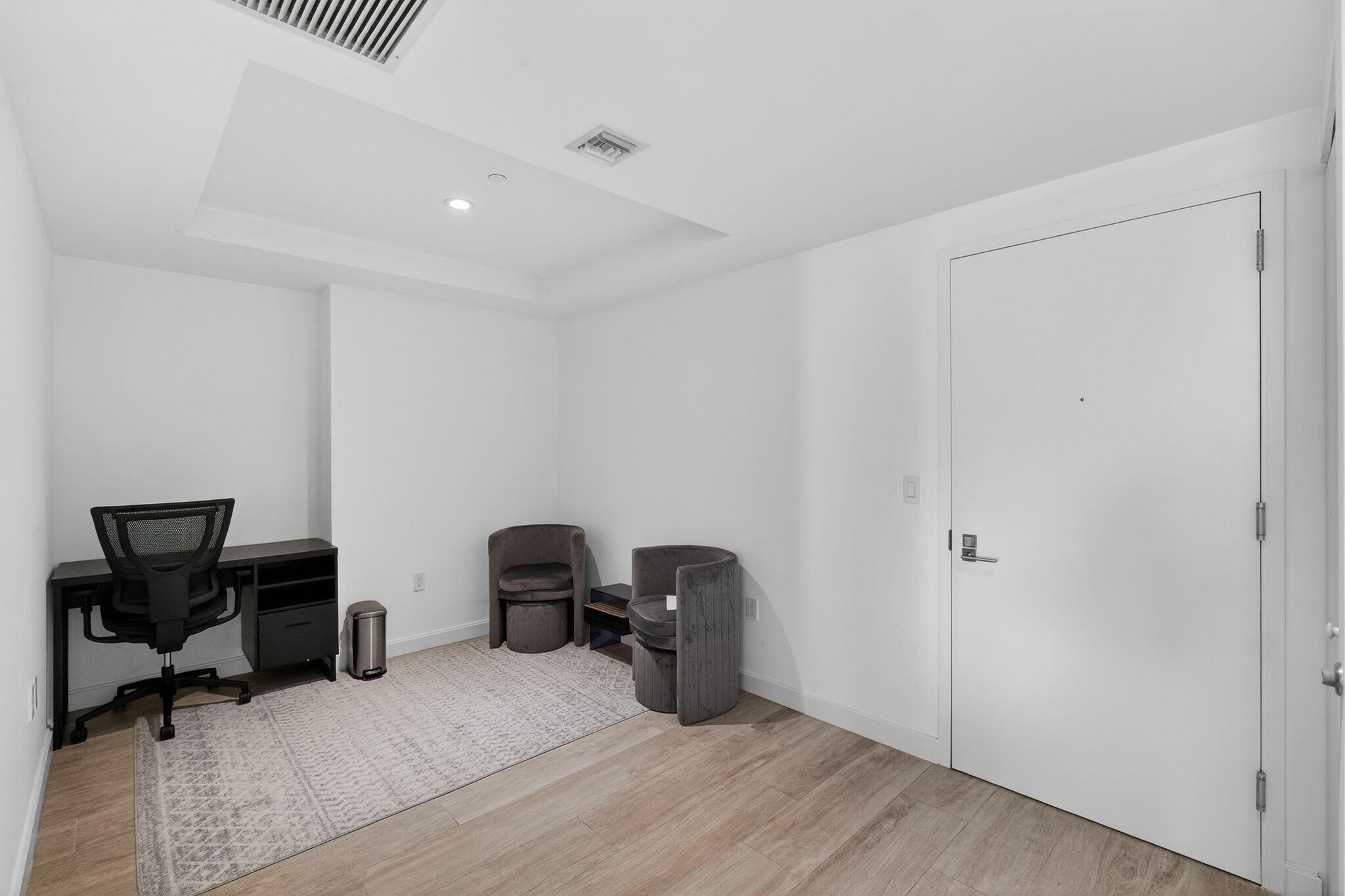 55 Southwest 9th Street, Unit 3704 Miami, FL 33130 - Photo 17 of 53 a view of a workspace with furniture and a gate