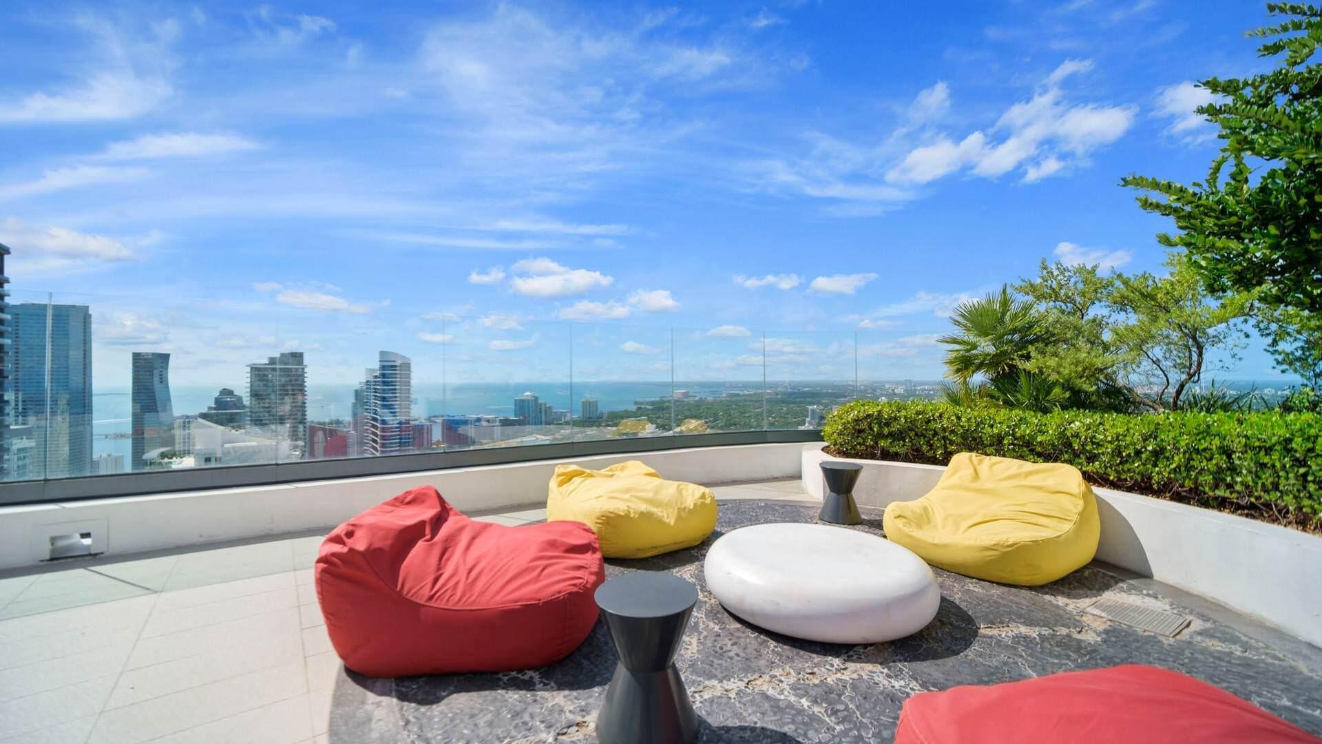 55 Southwest 9th Street, Unit 3704 Miami, FL 33130 - Photo 32 of 53 a view of swimming pool with outdoor seating space