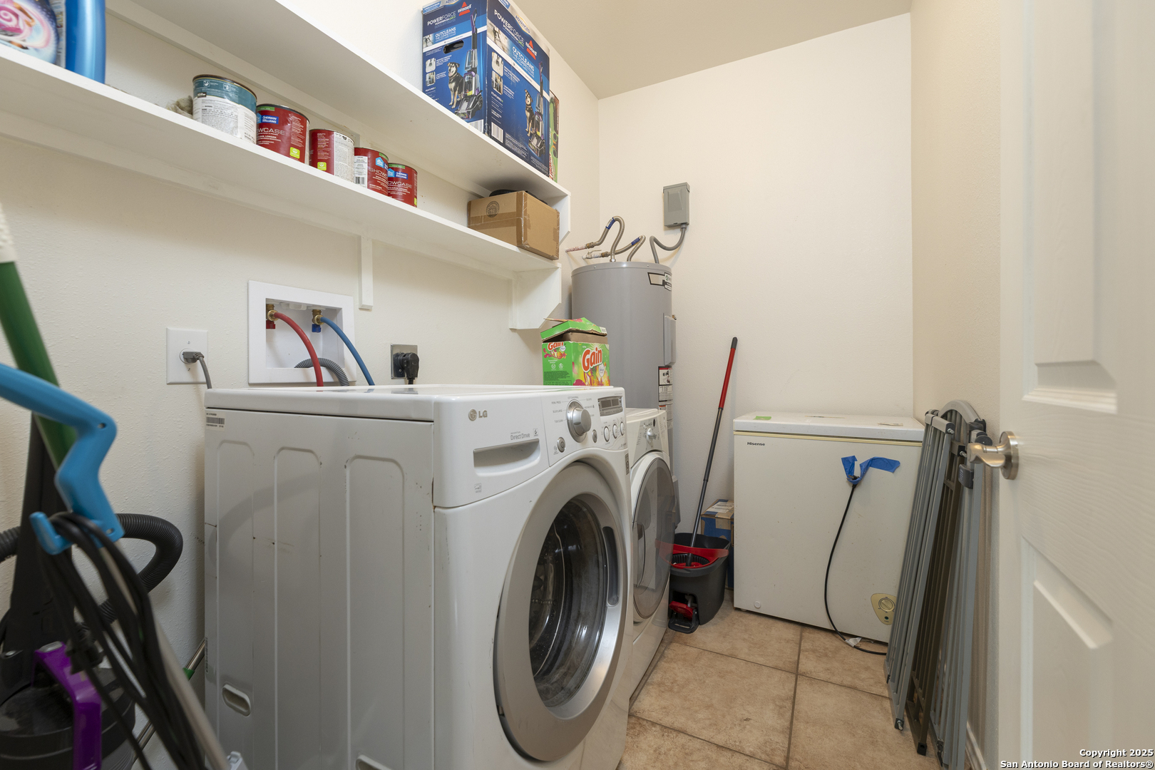 421 Cimarron Spring Branch, TX 78070 - Photo 12 of 29 a utility room with dryer and washer