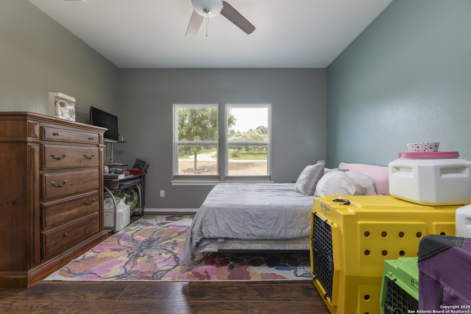 421 Cimarron Spring Branch, TX 78070 - Photo 13 of 29 a bedroom with a bed and wooden floor