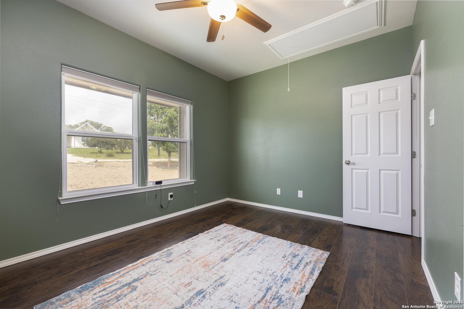 421 Cimarron Spring Branch, TX 78070 - Photo 15 of 29 a view of empty room with window and wooden floor