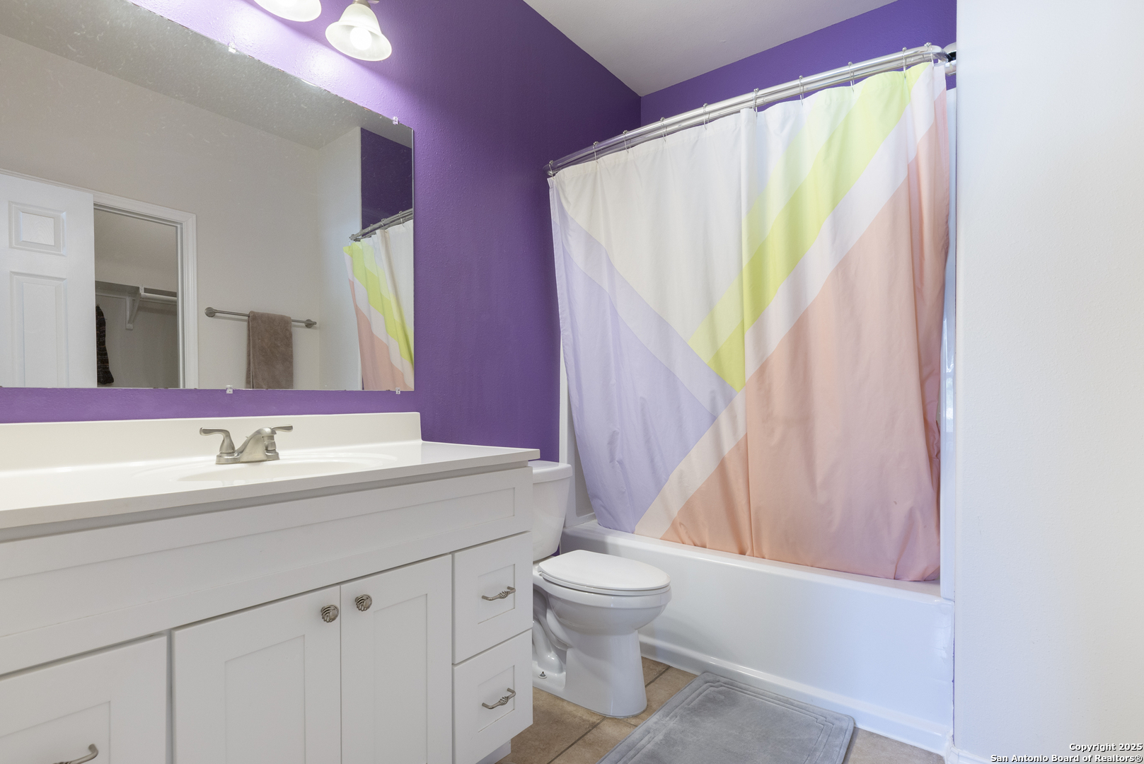 421 Cimarron Spring Branch, TX 78070 - Photo 16 of 29 a bathroom with a sink a toilet and a mirror