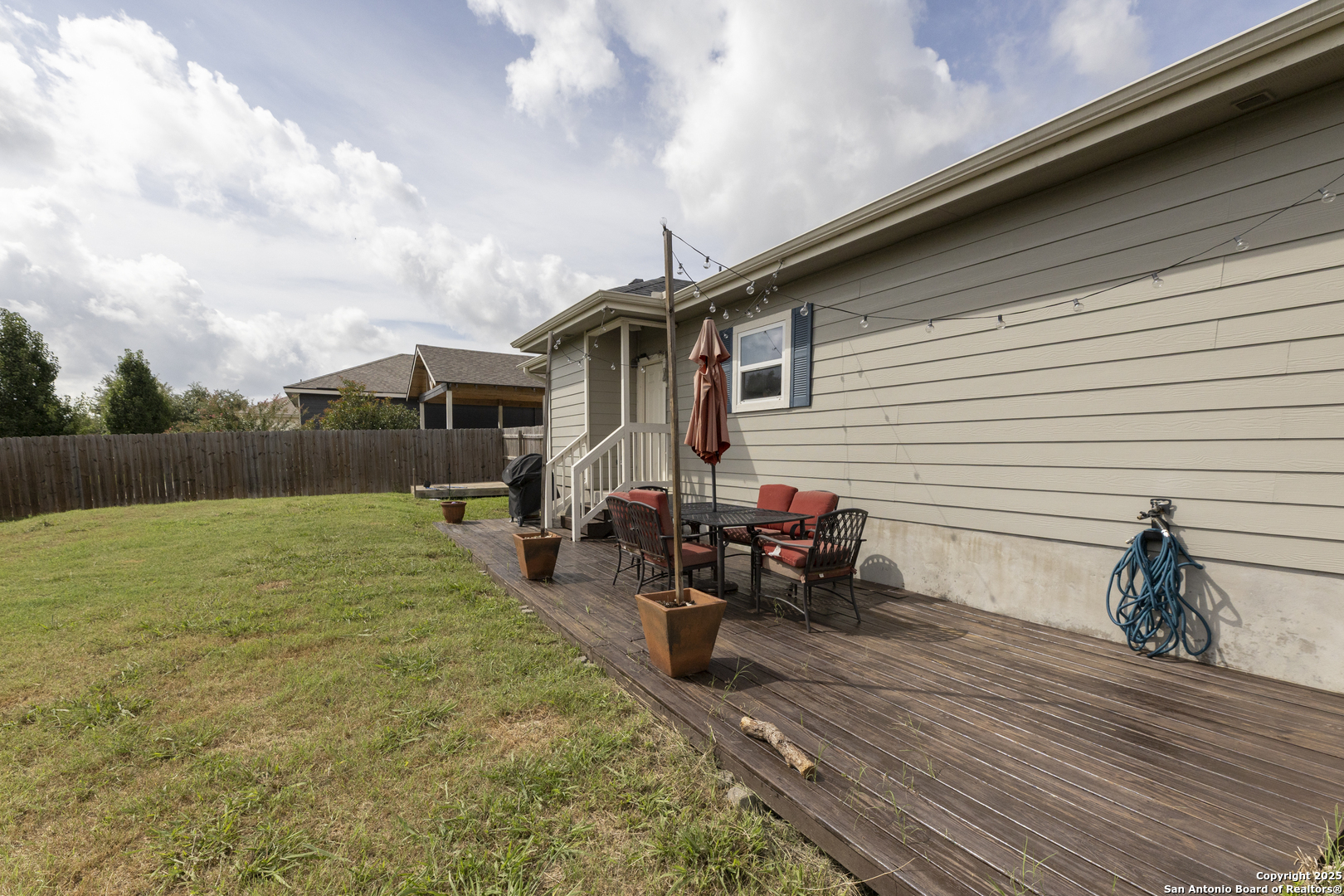 421 Cimarron Spring Branch, TX 78070 - Photo 23 of 29 a backyard of a house with table and chairs