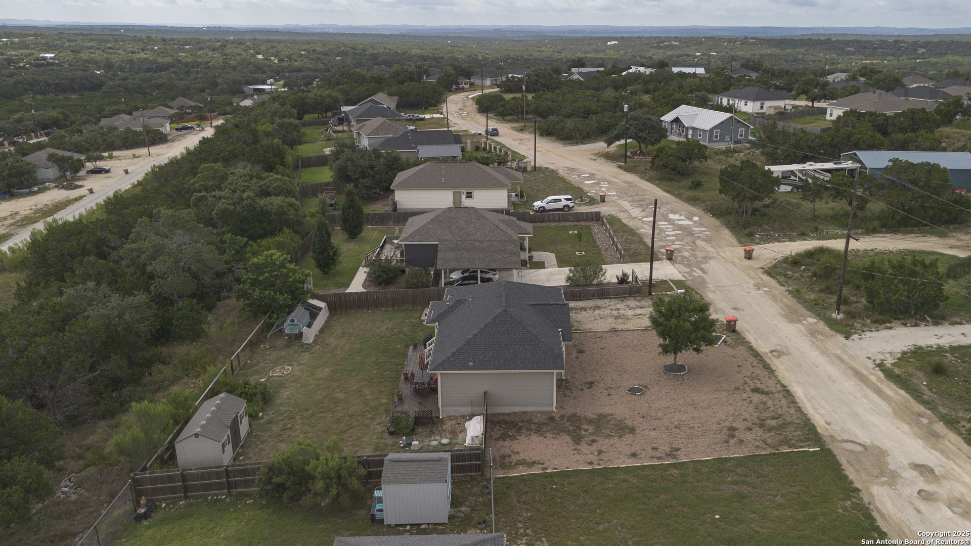421 Cimarron Spring Branch, TX 78070 - Photo 25 of 29 an aerial view of a house with a yard