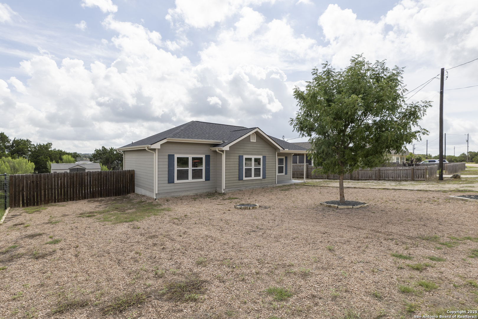 421 Cimarron Spring Branch, TX 78070 - Photo 4 of 29 a house with trees in the background