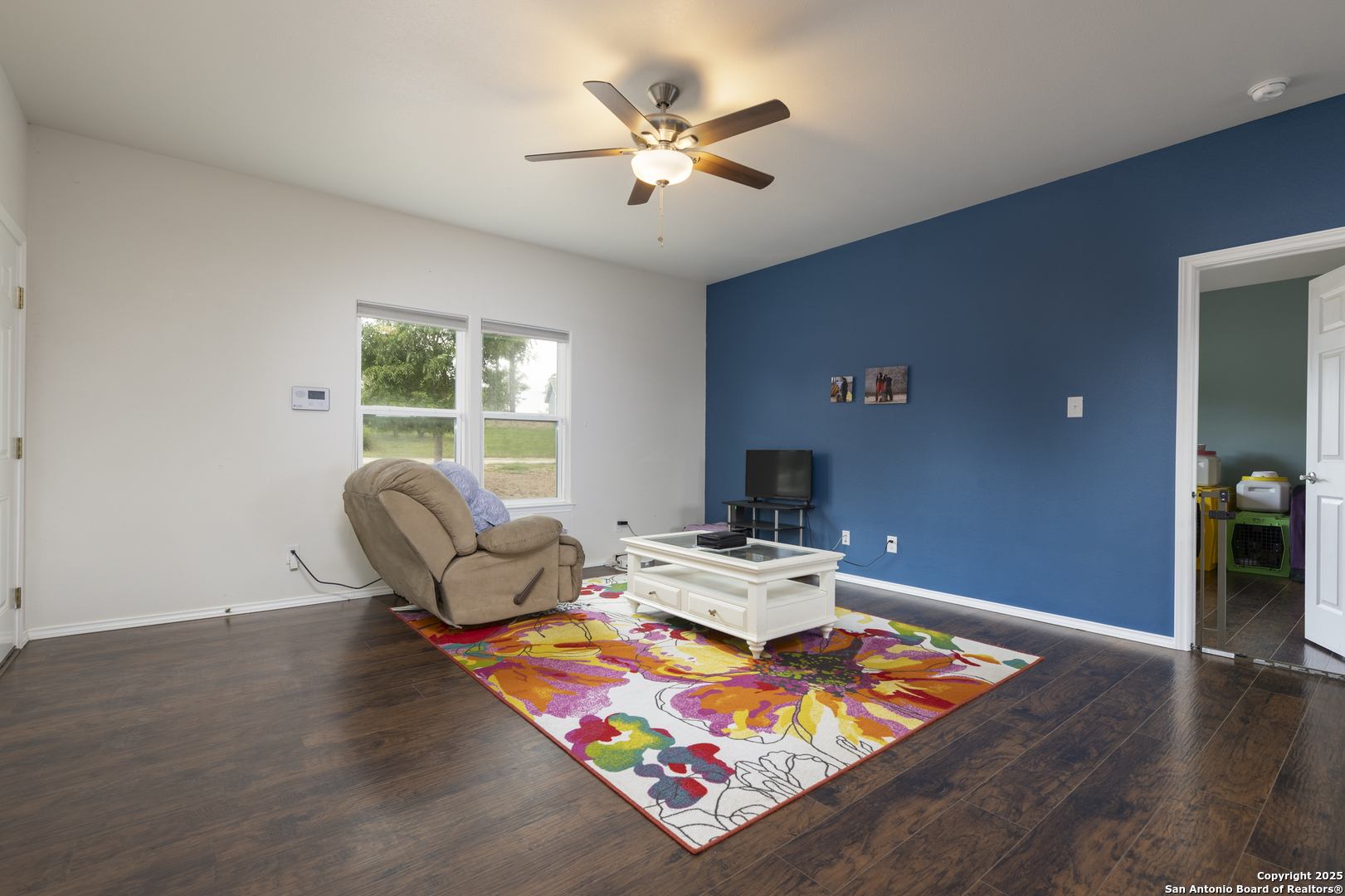 421 Cimarron Spring Branch, TX 78070 - Photo 5 of 29 a living room with furniture and a large window