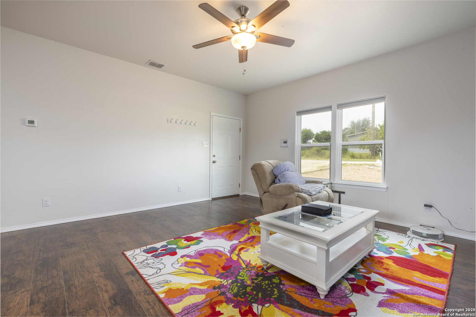 421 Cimarron Spring Branch, TX 78070 - Photo 7 of 29 a bed room with furniture and a window