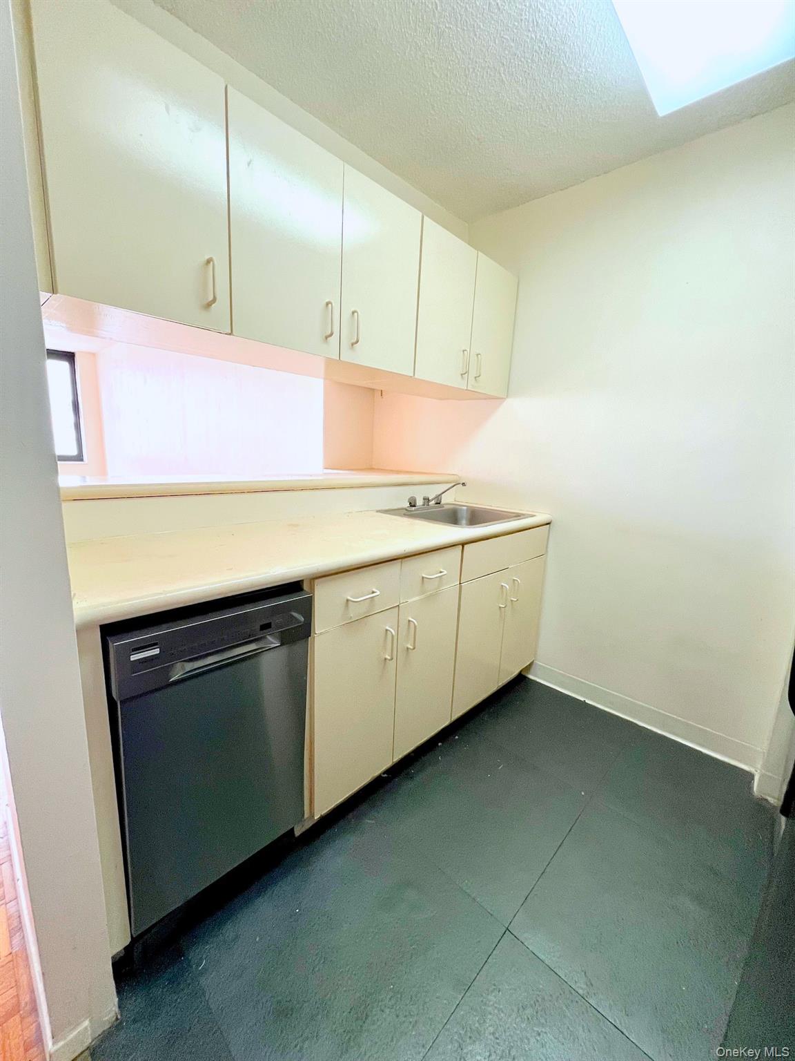 376 Broadway, Unit 11D Manhattan, NY 10013 - Photo 8 of 11 a utility room with a sink