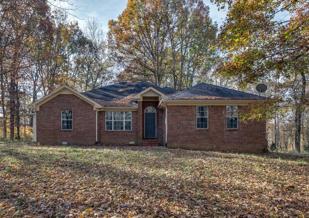 639 Vaughan's Gap Road Spring Hill, TN 37174 - Photo 1 of 19 front view of house with a yard