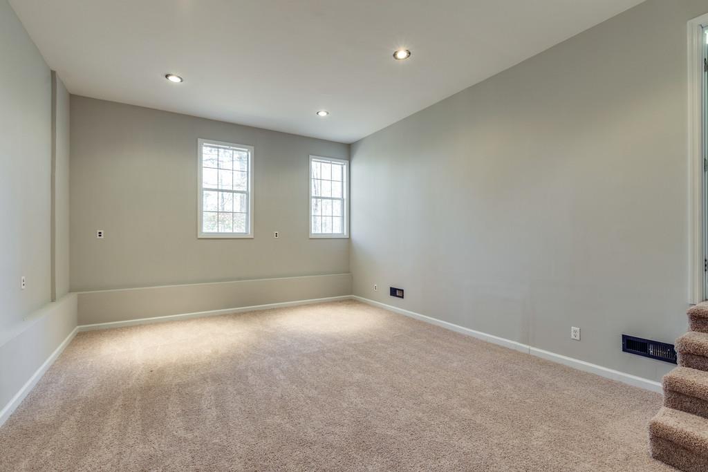 639 Vaughan's Gap Road Spring Hill, TN 37174 - Photo 15 of 19 an empty room with windows