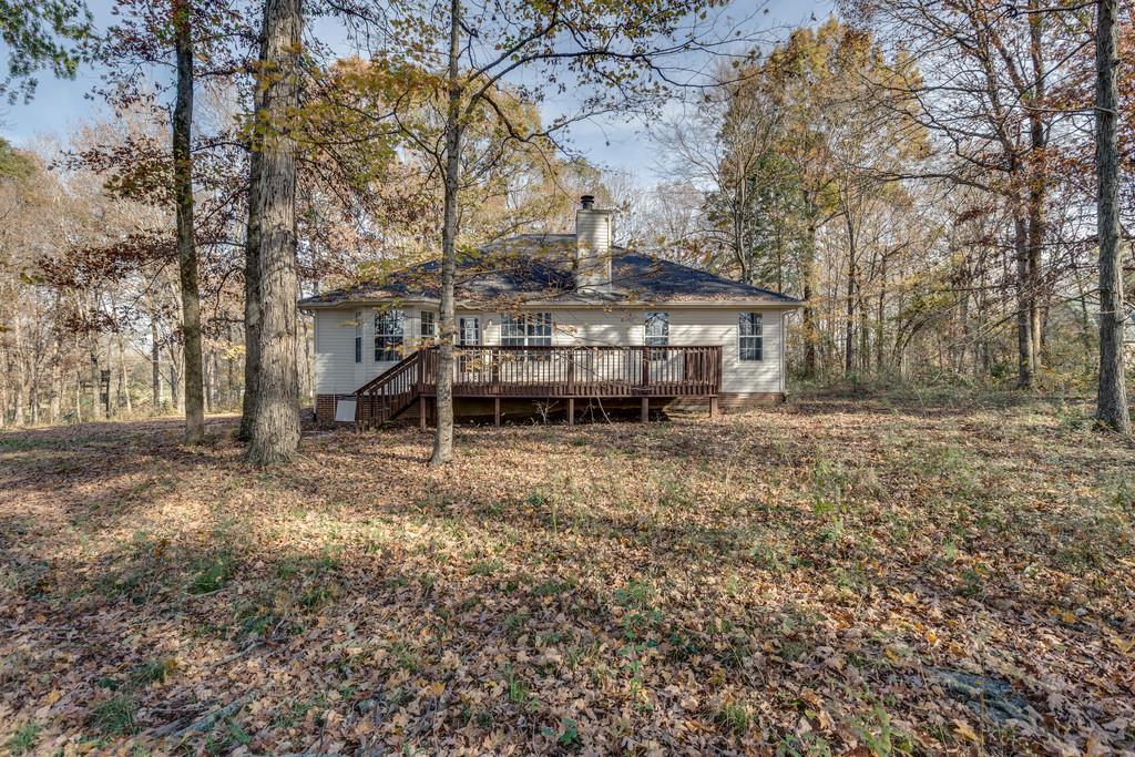639 Vaughan's Gap Road Spring Hill, TN 37174 - Photo 17 of 19 a front view of a house with a yard