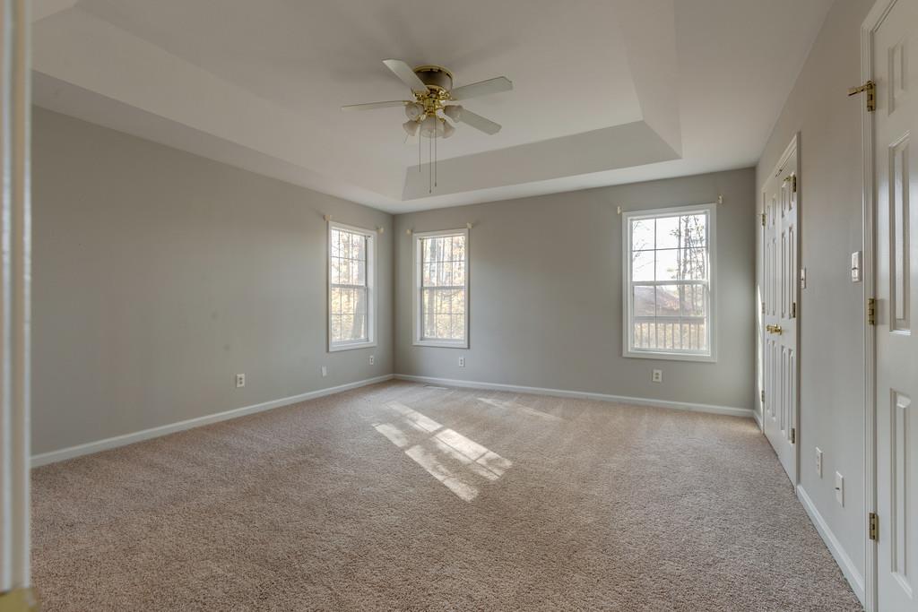 639 Vaughan's Gap Road Spring Hill, TN 37174 - Photo 9 of 19 a view of an empty room with a window