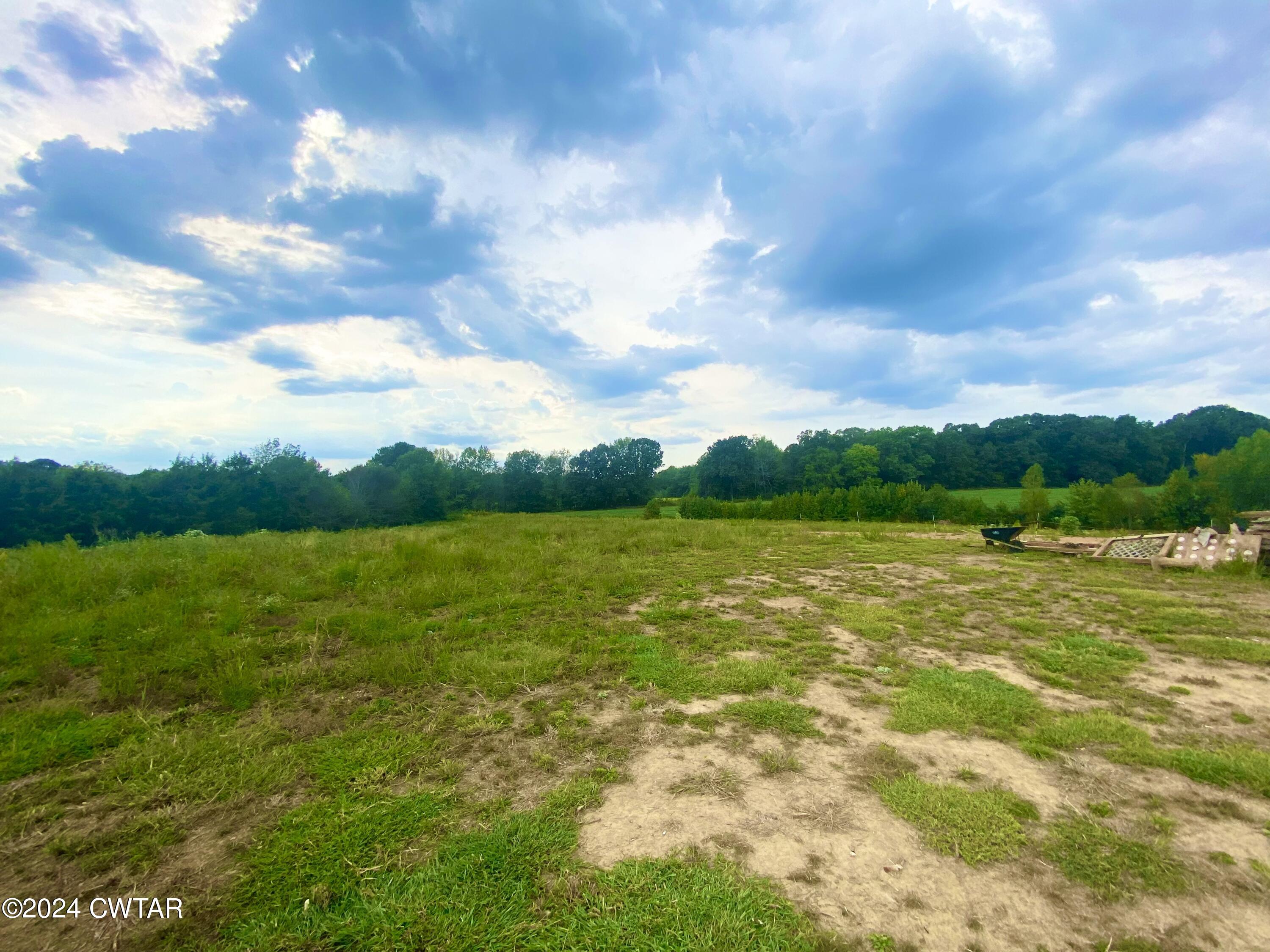 4474 Flatwoods Road Camden, TN 38320 - Photo 15 of 18 a view of an ocean from a yard