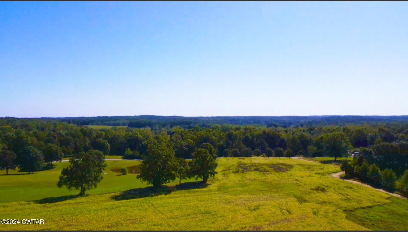 4474 Flatwoods Road Camden, TN 38320 - Photo 5 of 18 a view of lake view and mountain view