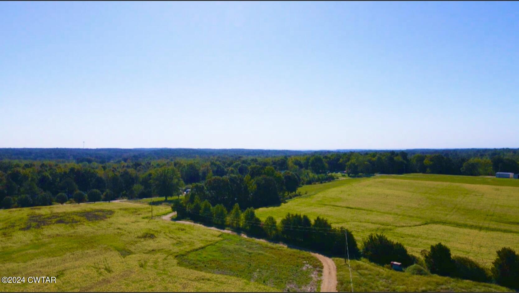 4474 Flatwoods Road Camden, TN 38320 - Photo 6 of 18 a view of an outdoor space and mountain view