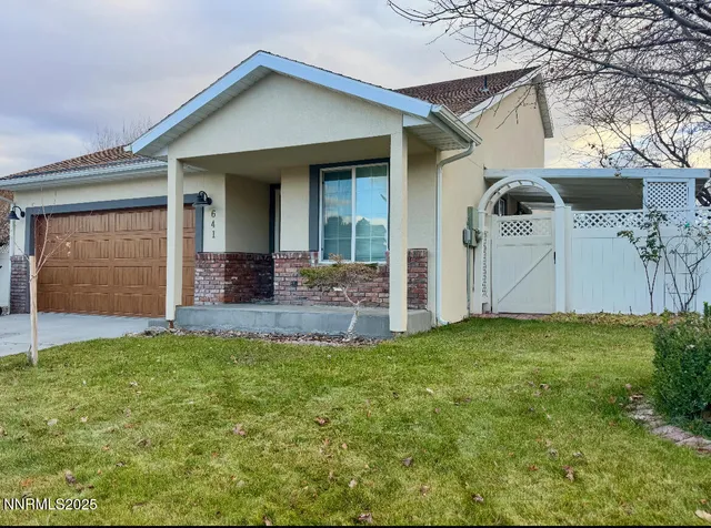 a front view of house with yard