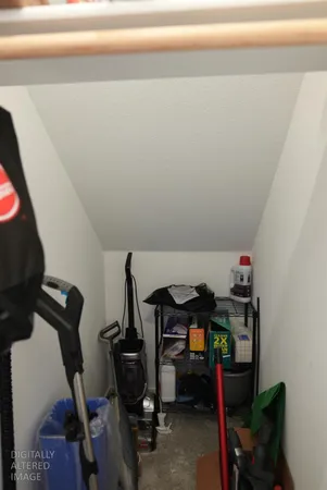 a room with a bed and flat screen tv