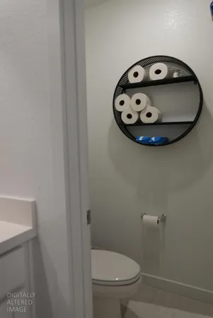 a bathroom with a toilet and sink