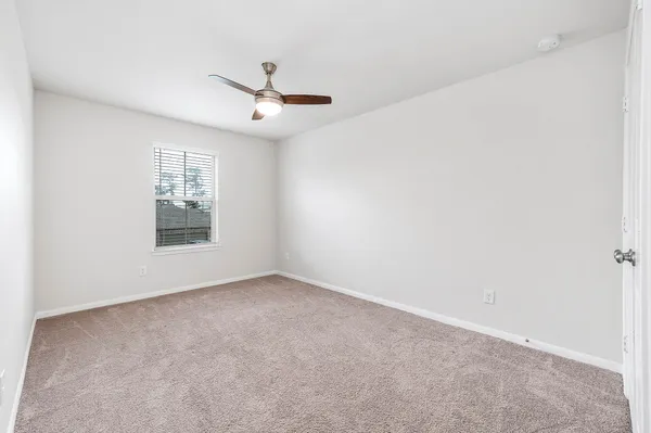 a view of a house with backyard and garden