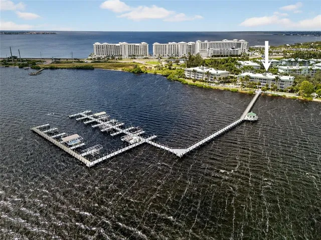 a view of a balcony with chair and a table