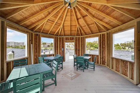 a view of a balcony with chairs