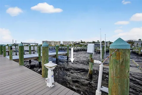 a view of a balcony with wooden floor