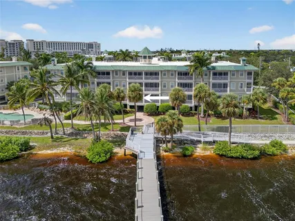a view of a house with a outdoor space and sitting area