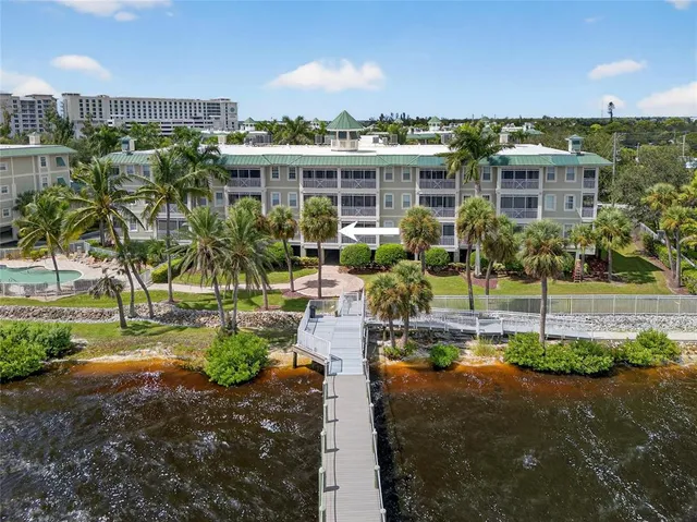 a view of a house with a outdoor space and sitting area