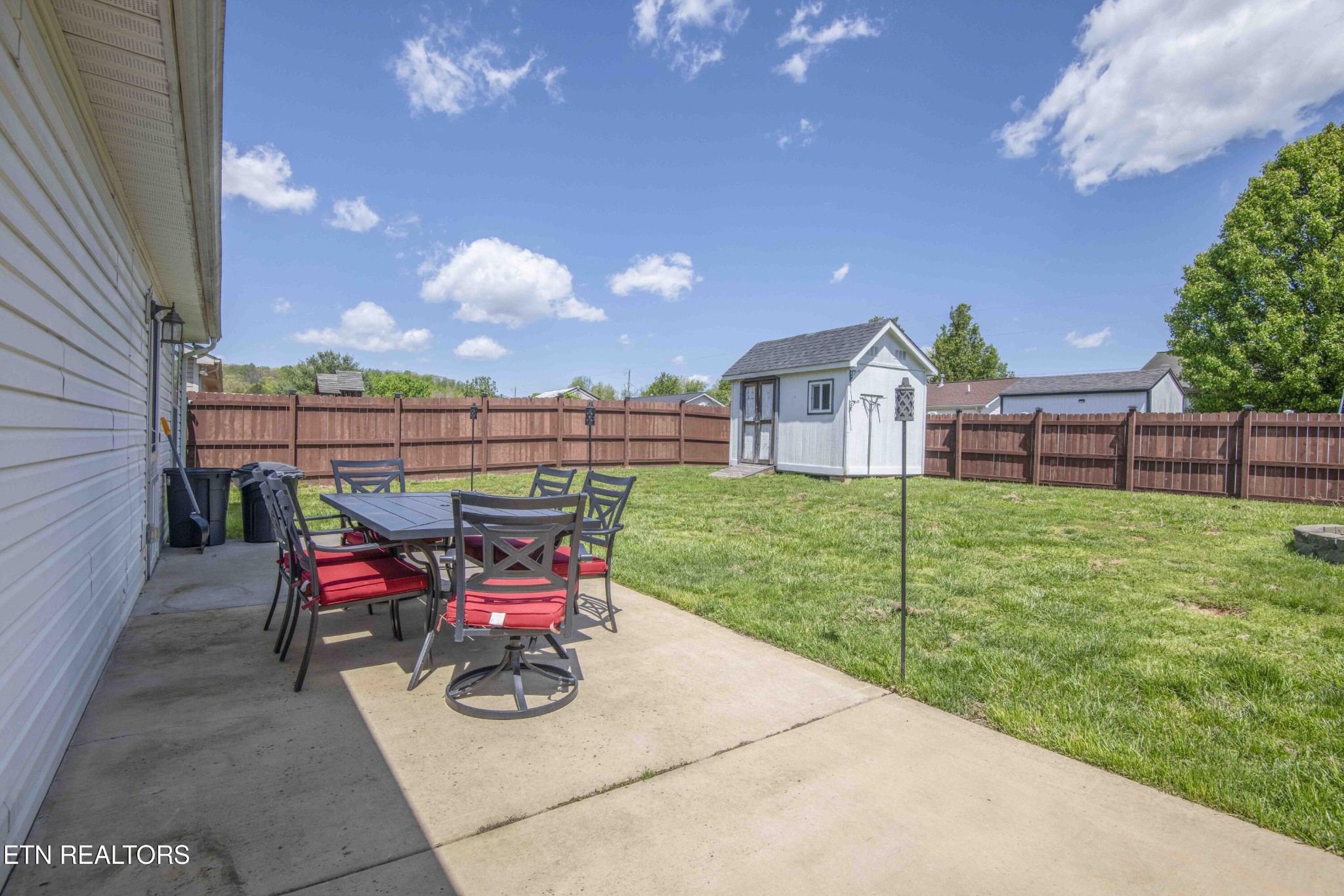 7533 Gary White Road Corryton, TN 37721 - Photo 36 of 44 a view of a patio with a yard